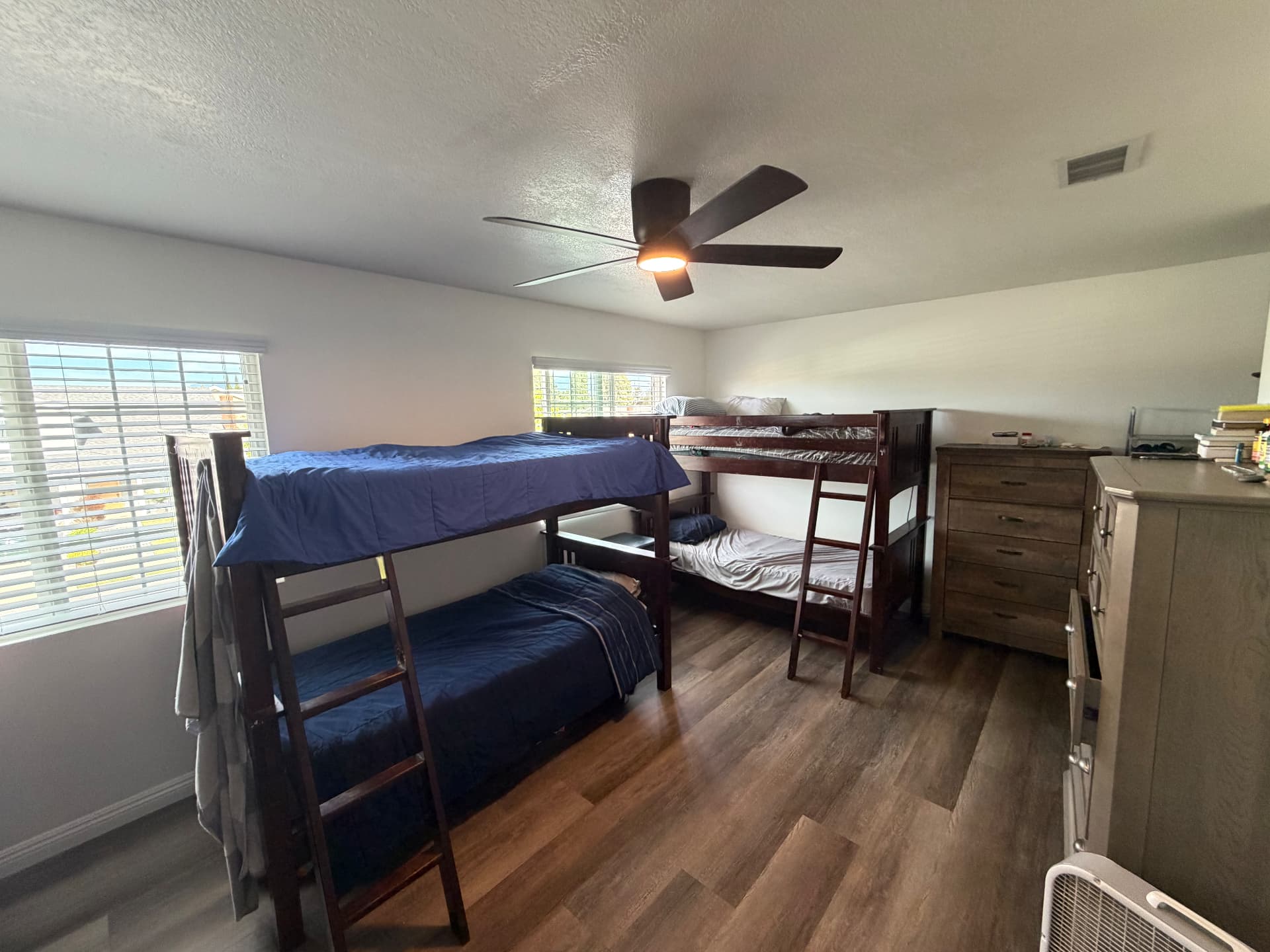 Shared bedroom with two sets of bunk beds